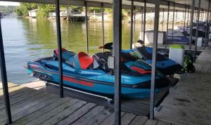 A used jet ski lift installed in a dock at Lake of the Ozarks