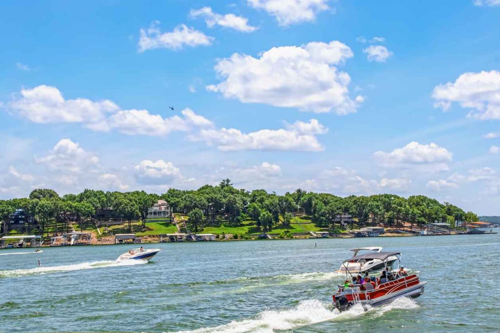 Beautiful overlook of a lake with boats on the water with the help of floating boat lifts