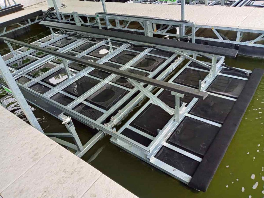A new boat lift installed in a floating dock slip at Lake of the Ozarks
