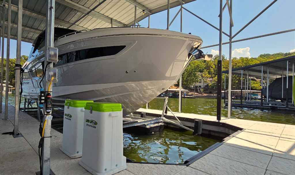 LOTO Lift pneumatic floating boat lift with dual poly tanks and Captain's Choice control unit after professional calibration and testing at Lake of the Ozarks Camdenton, MO.